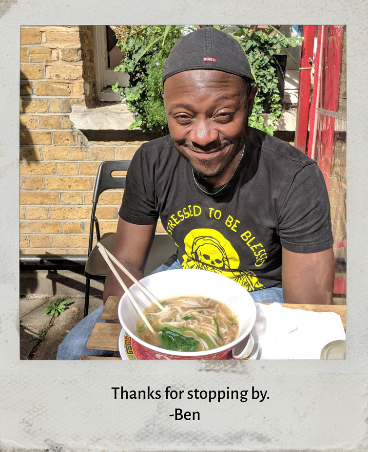 Photo of the author eating pho.